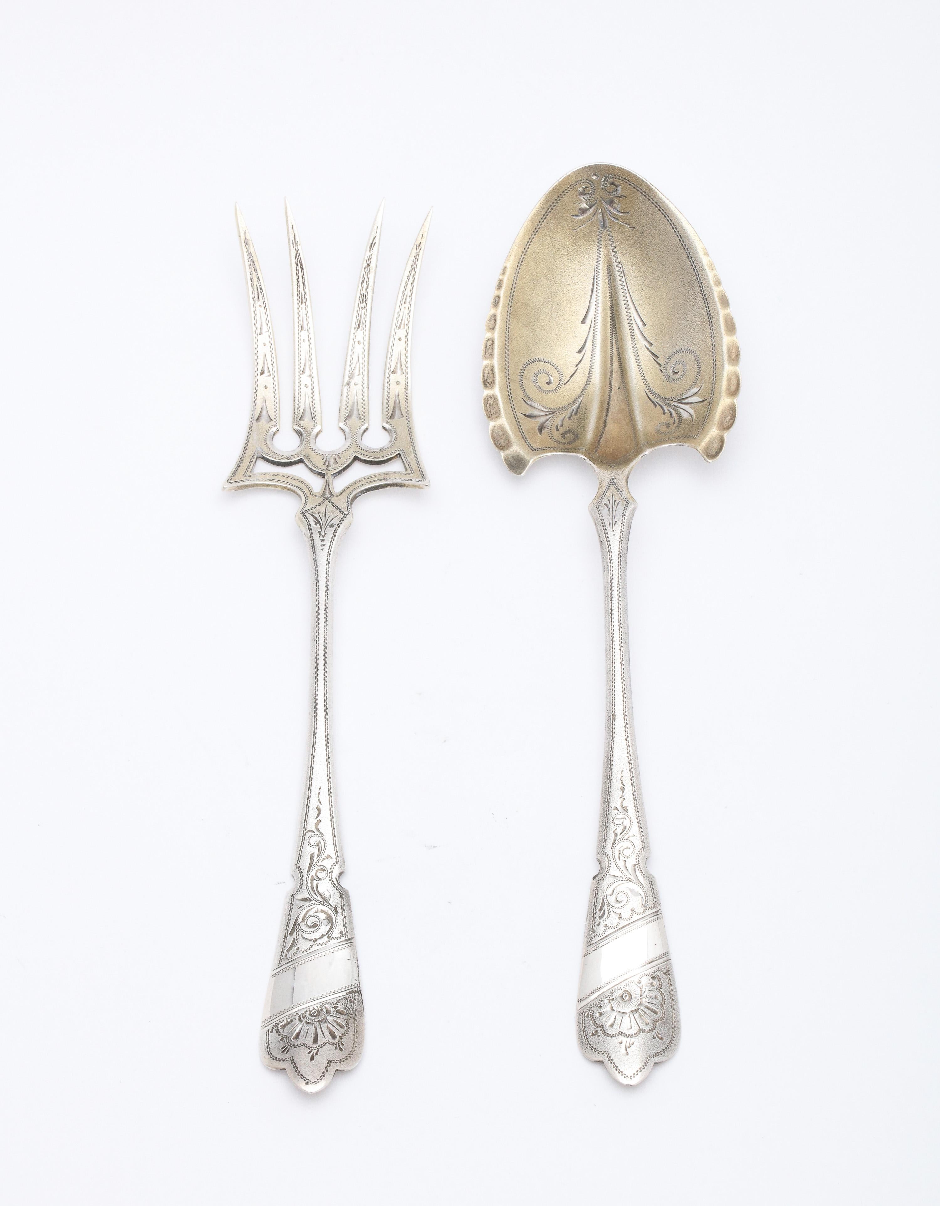 Edwardian Period, Continental Silver (.800), parcel gilt cake/dessert serving set, Germany, Ca. 1910. Bright cut design of both pieces makes them look as if they are inset with jewels when light shines on them. The serving fork measures 7 inches