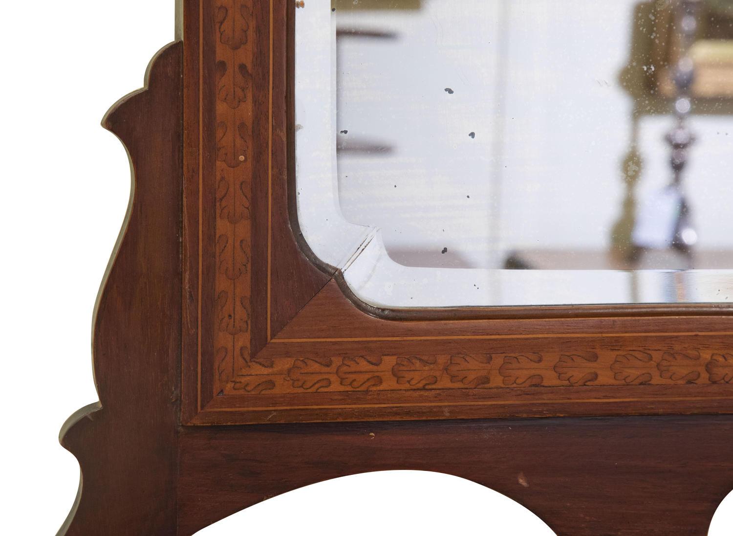 Edwardian period mahogany and inlaid wall mirror,

circa 1910.