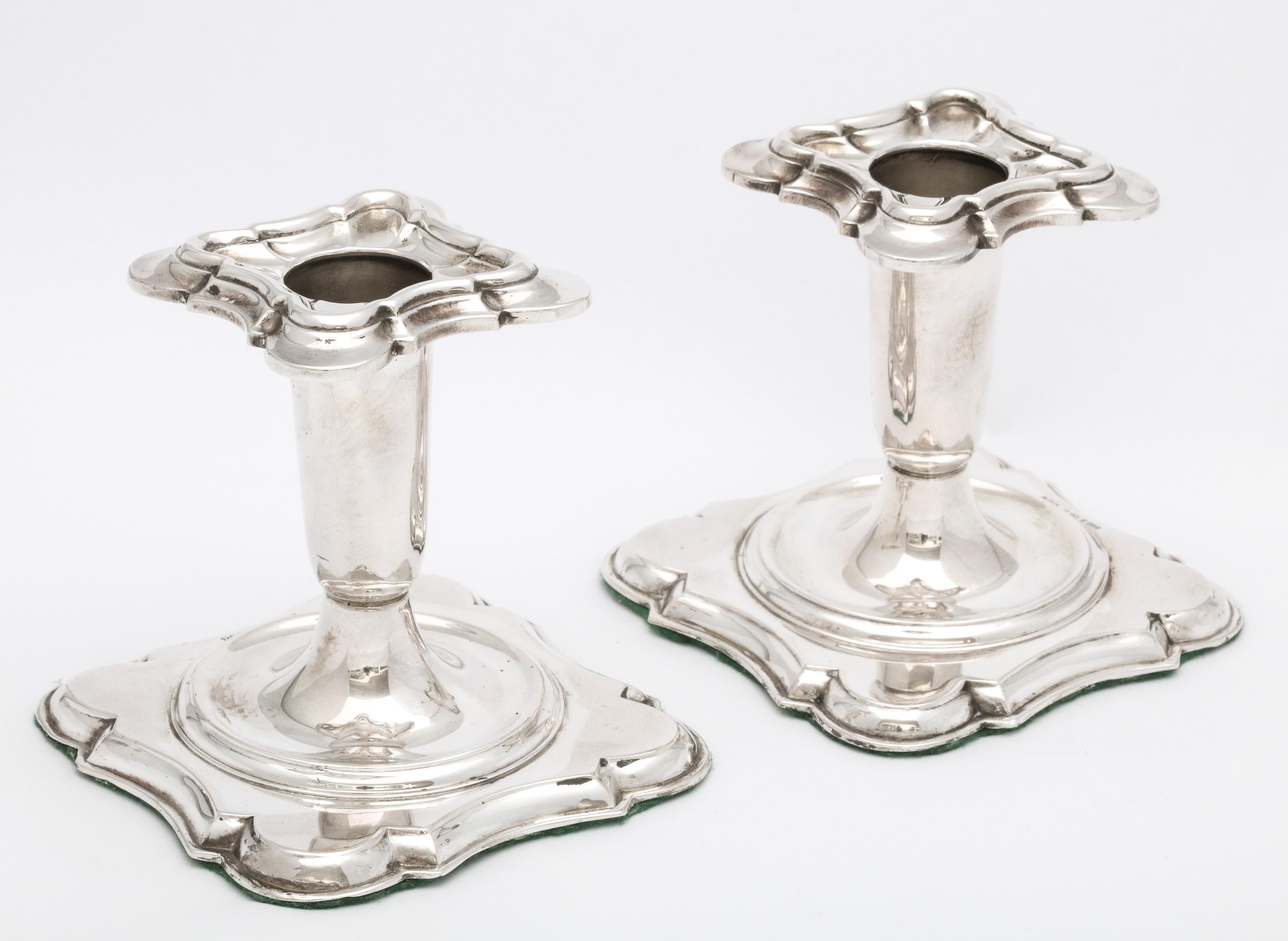 Edwardian pair of Continental silver(.830) candlesticks, Bergen, Norway, Ca. 1910, Theodor Olsens EFTF - maker. Each candlestick measures over 3 1/2 inches high x 3 1/2 inches deep (at deepest point) x 3 1/2 inches wide (at widest point). Each