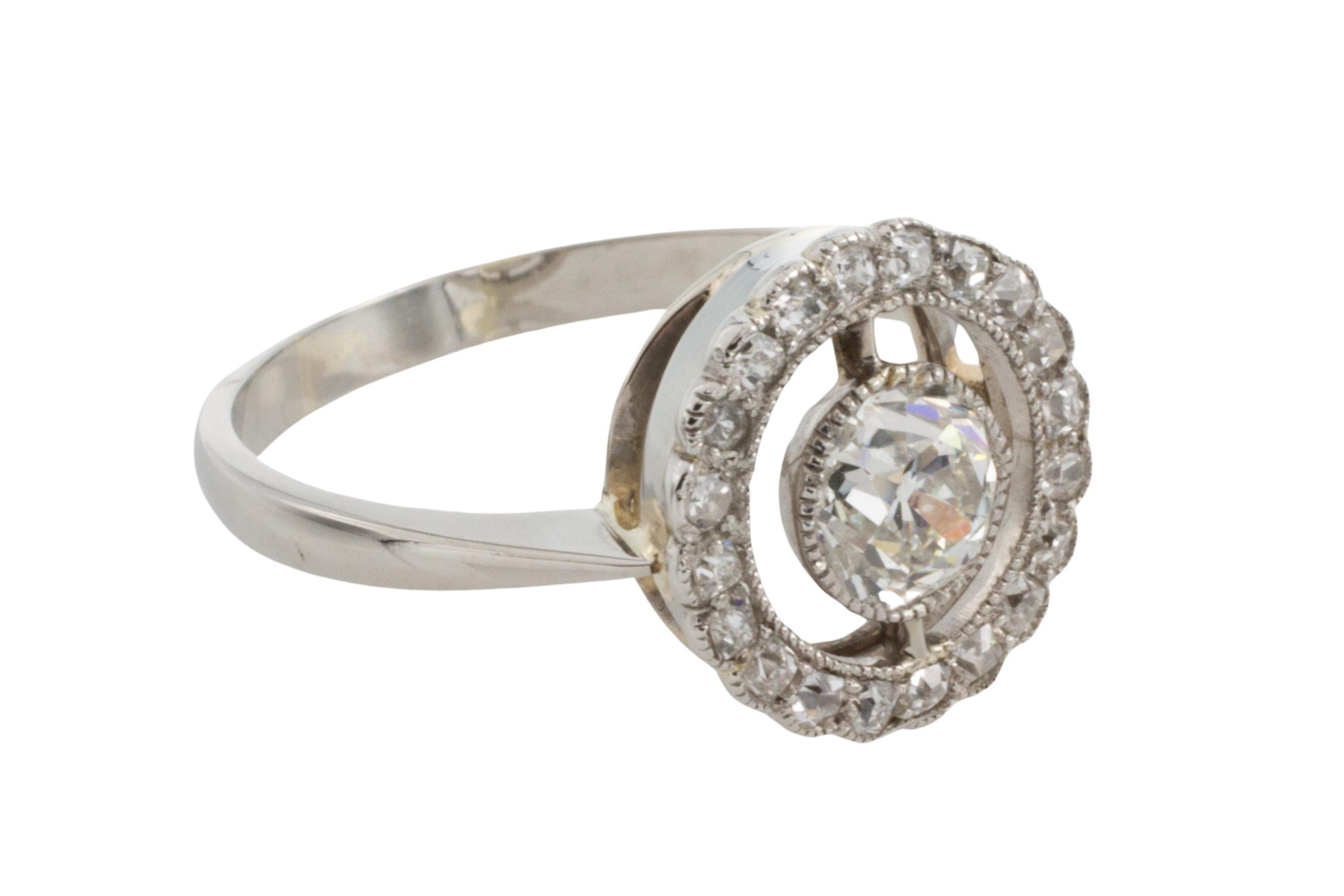 Old European Cut Edwardian period platinum target ring with old cut diamonds For Sale
