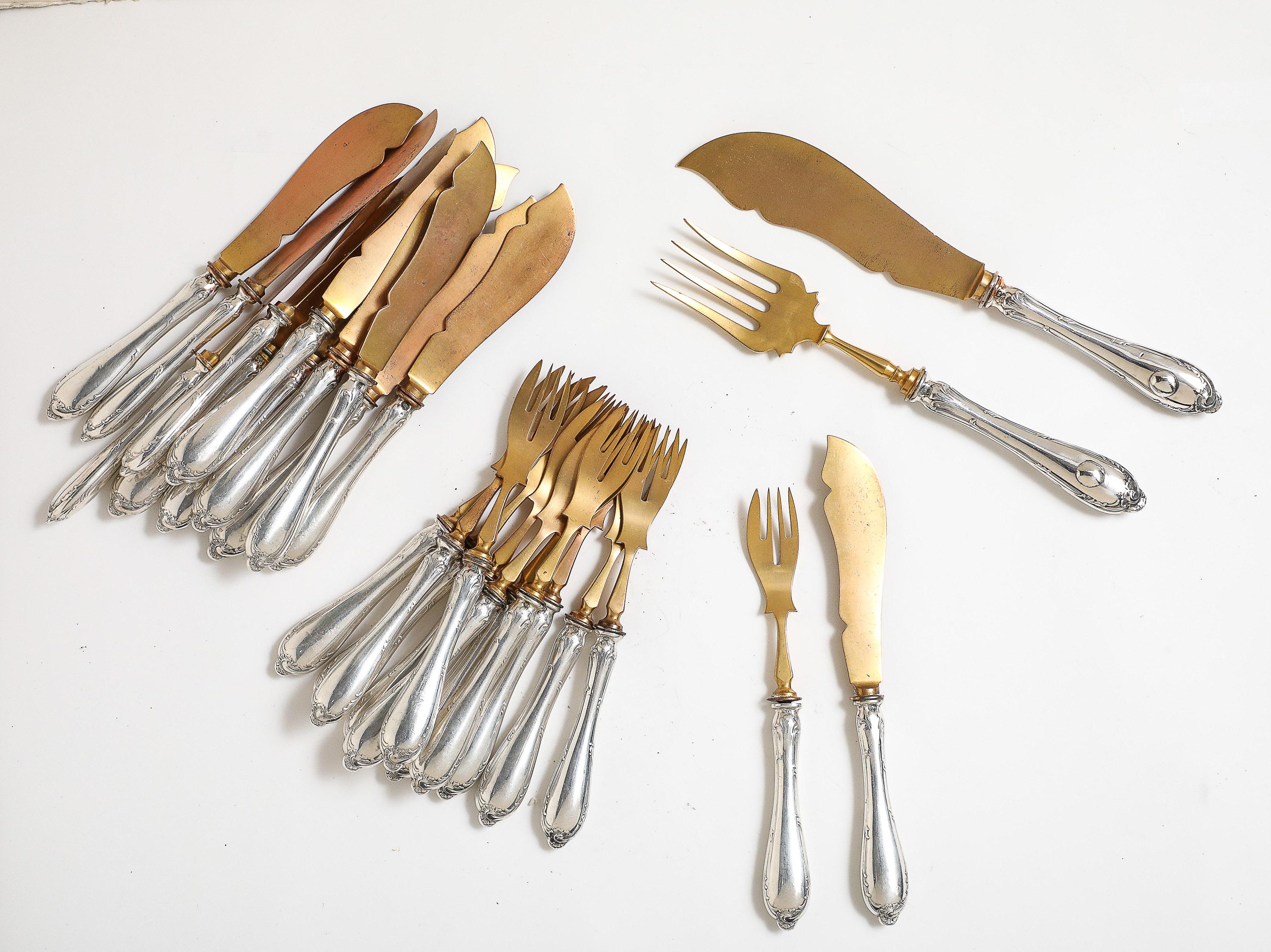 Edwardian Period, Russian Continental Silver (.840) fish set, Russia, Ca. 1910, service for 12, consisting of: 12 Continental Silver-handled fish knives, 12 Continental Silver-handled fish forks, and a large, Continental Silver- handled fish serving