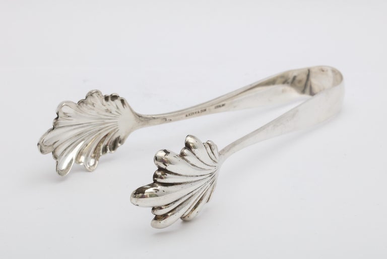 Edwardian Period, sterling silver ice tongs, S. Kirk and Son, Baltimore, Maryland, circa. 1900, Old Maryland - pattern. Measures 6 1/2 inches long x 3 inches deep (at deepest point) x 1 1/2 inches high (when lying flat). Weighs 2.455 troy ounces.