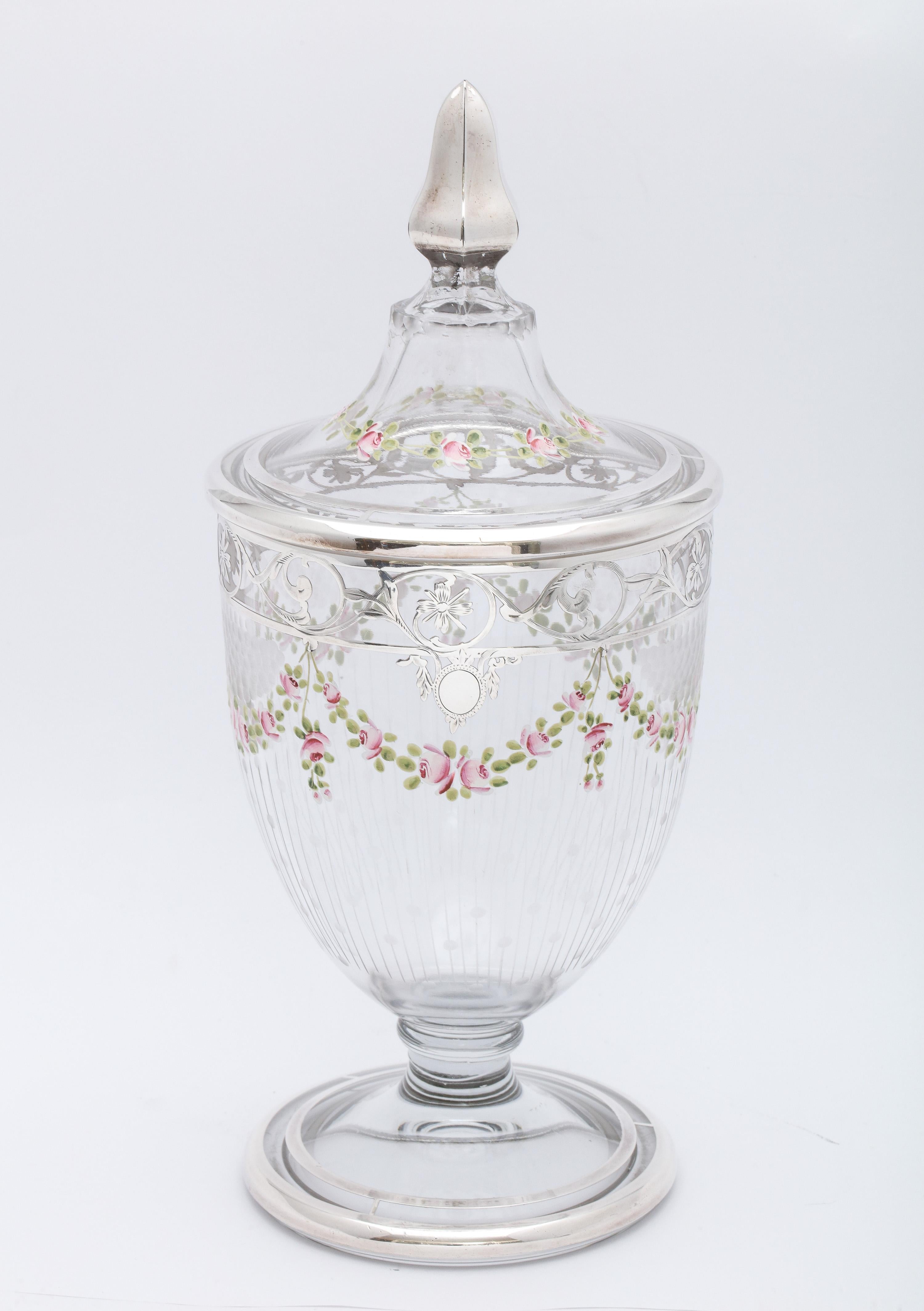 Edwardian Period, sterling silver-overlay (with pink enameled rose garlands) glass sweetmeats jar, American, Ca 1910 (see photographs for arrow pointing to sterling silver mark). Enameled rose garlands and sterling silver decorate both the jar