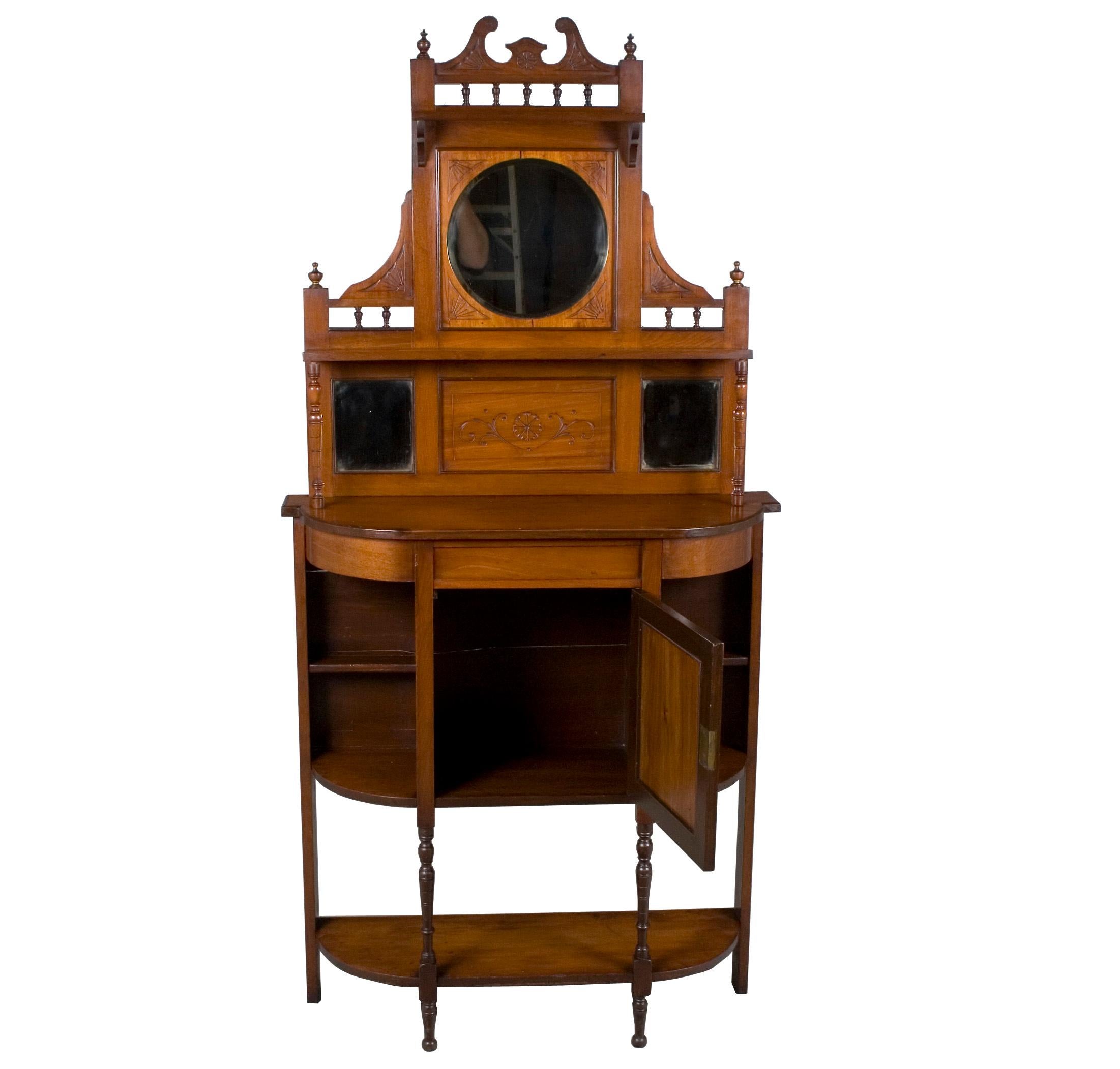 This beautiful piece of furniture comes from England where it was made circa 1910, making it an Edwardian period piece. Today, the walnut remains gorgeous and has developed a stunning patina. It's height and narrow depth make it ideal for many