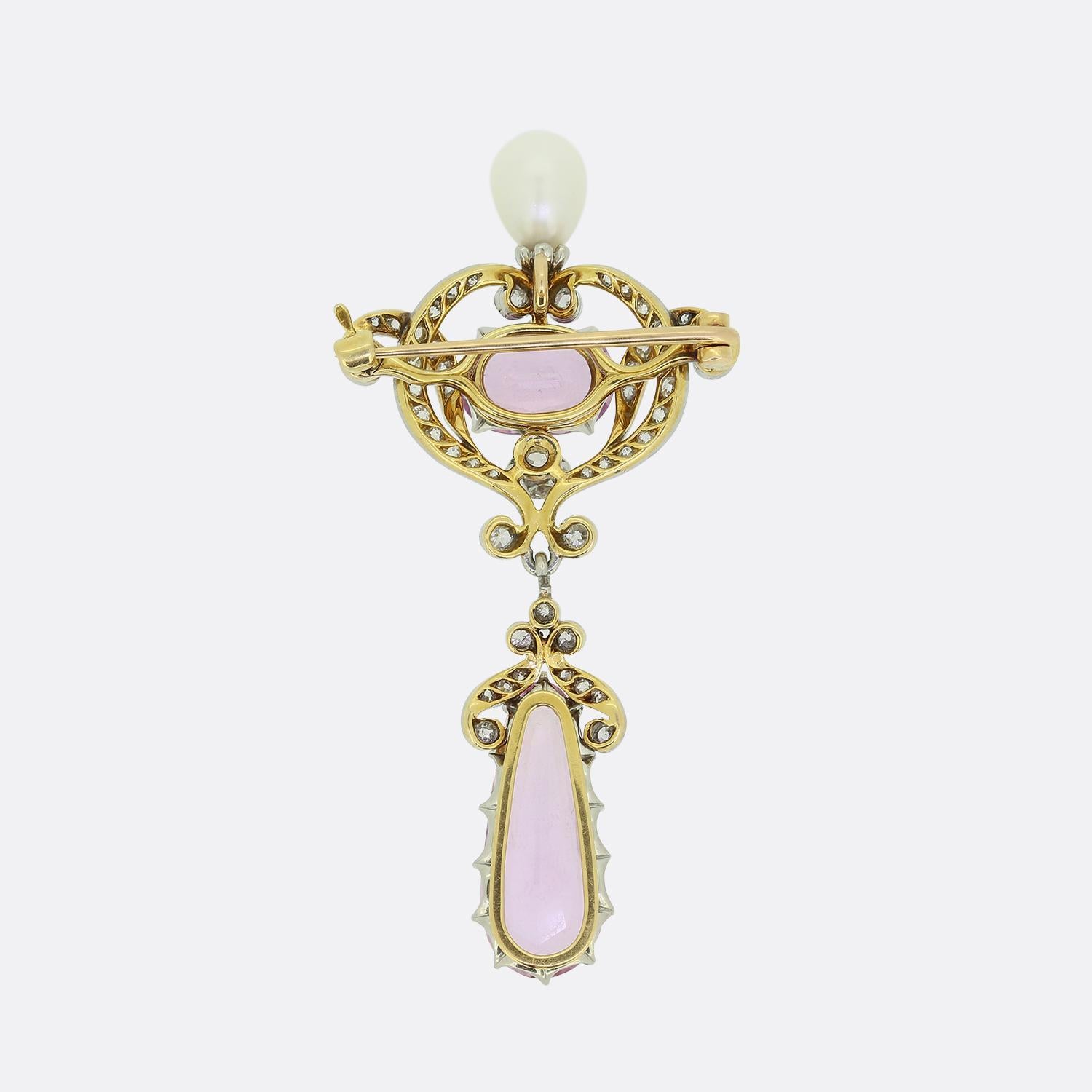 Here we have a remarkable drop brooch come pendant dating back to the Edwardian era. This antique piece has been crafted from 18ct yellow gold and showcases a curvaceous frame filled with round faceted old European cut diamonds of differing sizes.
