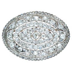 Spilla edoardiana in platino e oro 18 carati con diamante