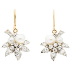 Edwardian Platinum and 1.10ct Diamond 
Natural Pearl Leaf Motif Earrings C.1910