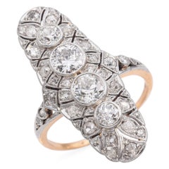 Edwardian Platinum and 14k Yellow Gold Diamond Knuckle Duster Ring