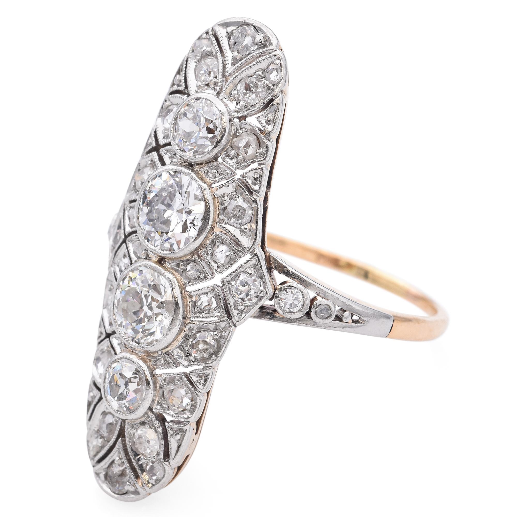 Edwardian Platinum and 14k Yellow Gold Diamond Knuckle Duster Ring In Good Condition For Sale In New York, NY