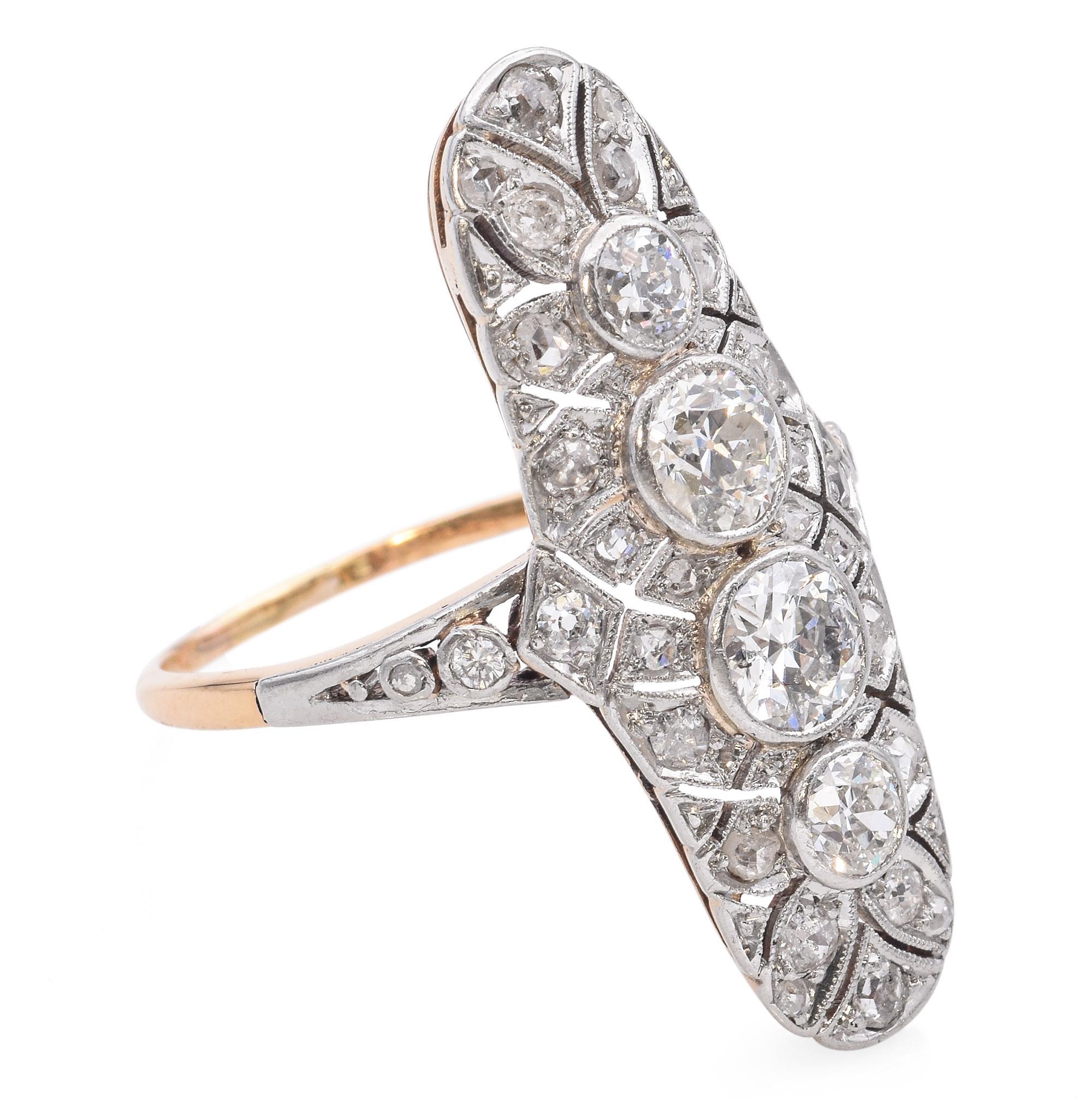 Edwardian Platinum and 14k Yellow Gold Diamond Knuckle Duster Ring For Sale 1