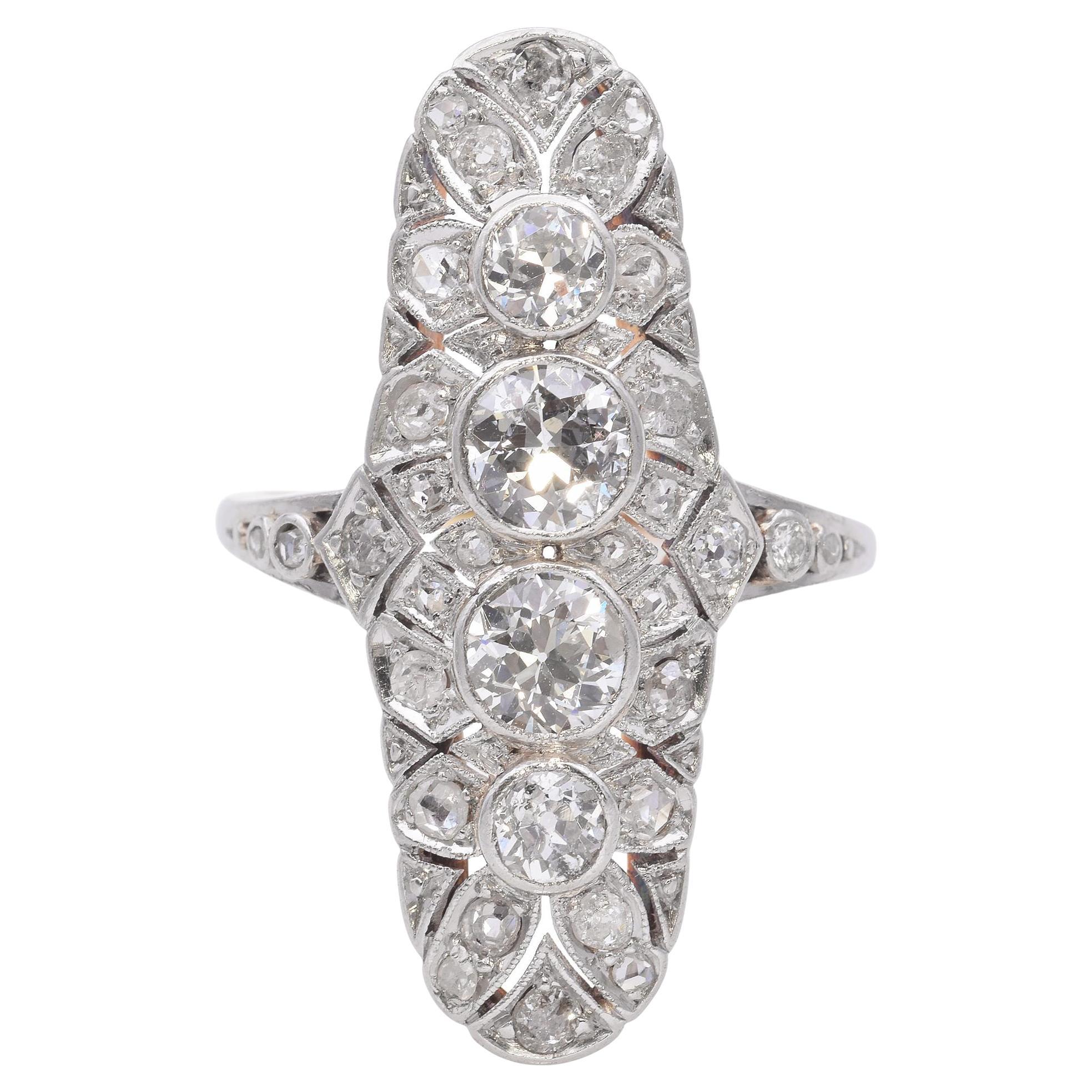 Edwardian Platinum and 14k Yellow Gold Diamond Knuckle Duster Ring For Sale