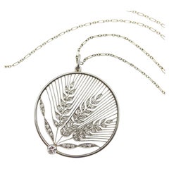 Collier édouardien en platine et or 18 carats avec pendentif en forme de blé ajouré et orné de diamants