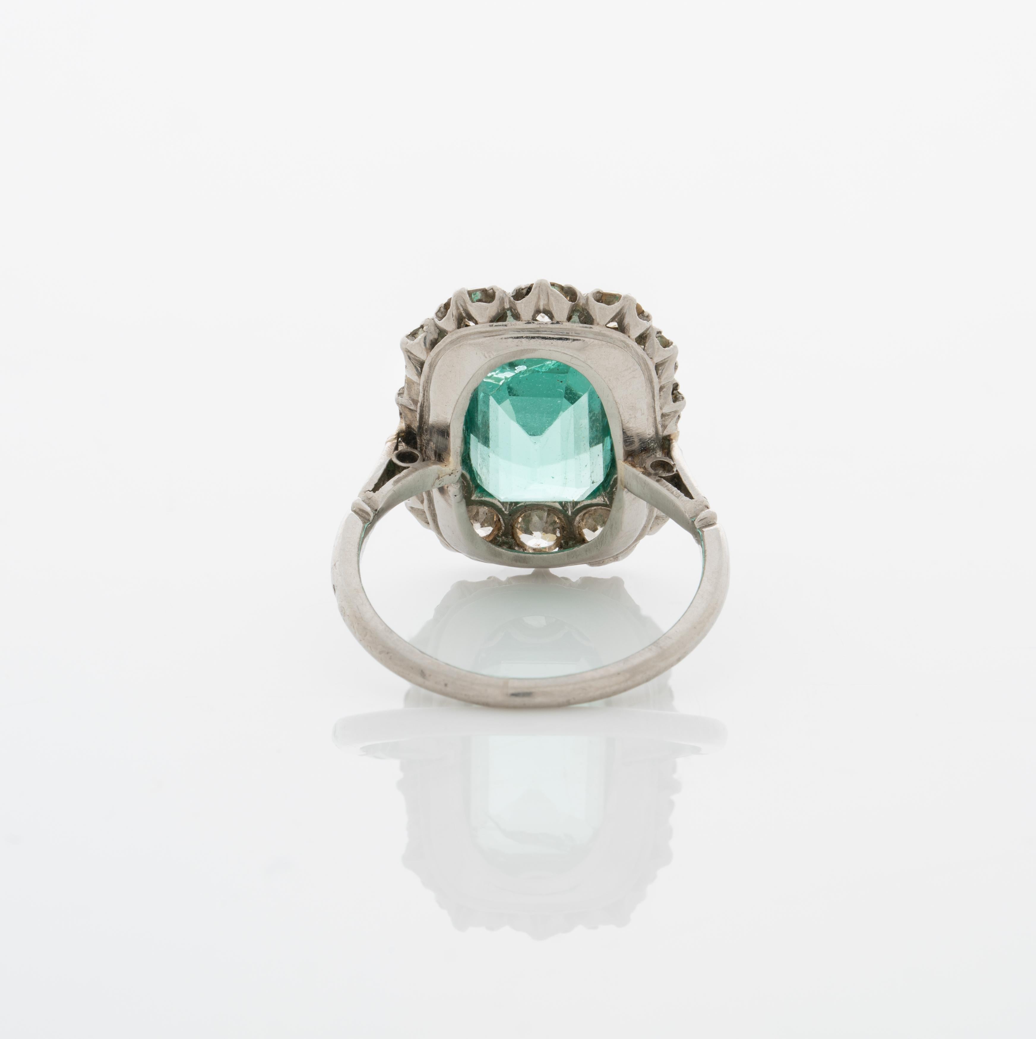 Women's or Men's Edwardian Platinum and 4.5 Carat Colombian Emerald Ring and Diamond Ring For Sale