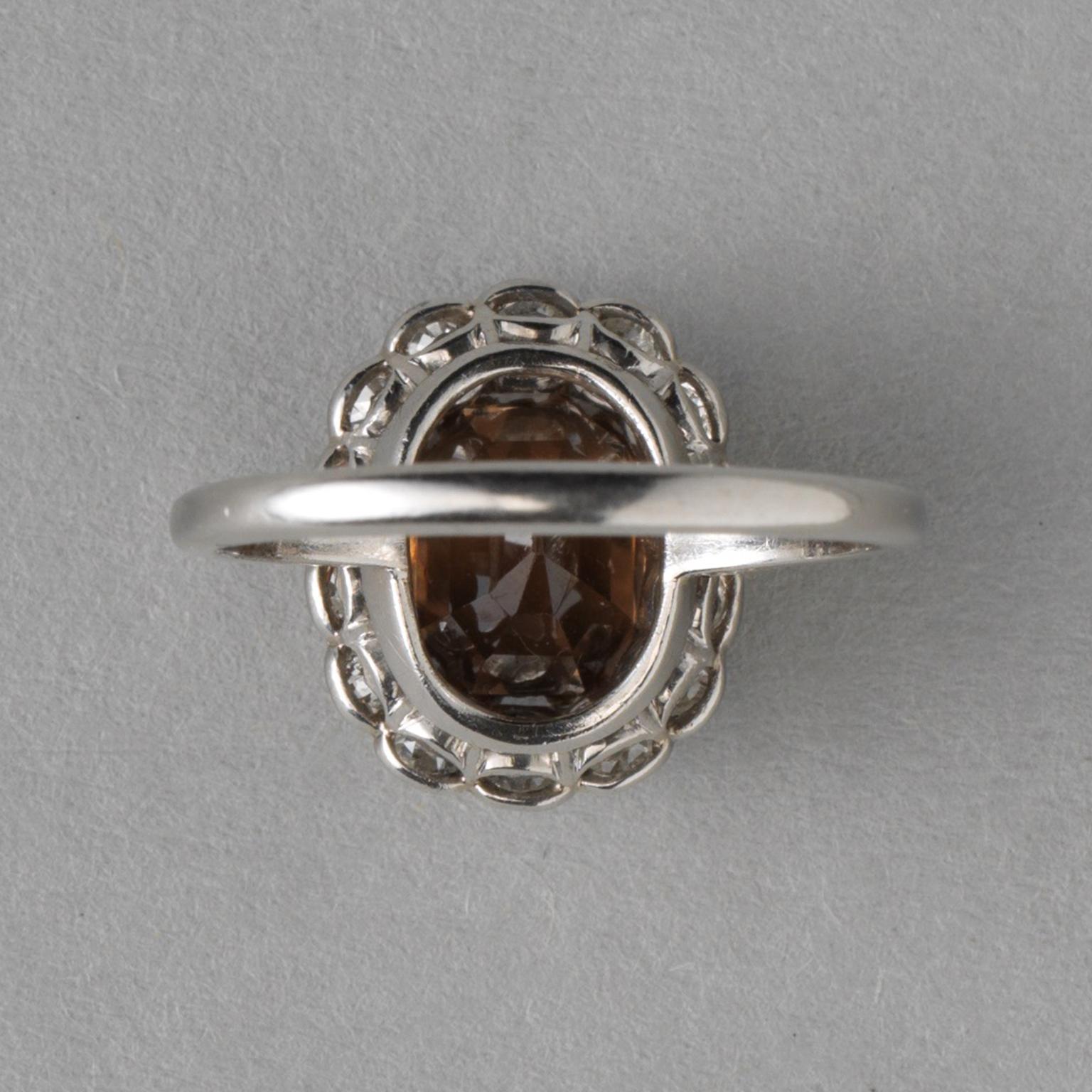Oval Cut Edwardian Platinum Diamond and Zircon Ring