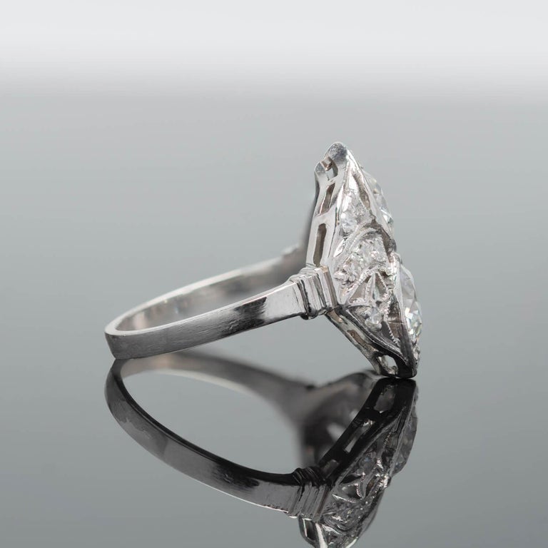 A one-of-a-kind ring from the Edwardian (ca1910s) era! Handcrafted in platinum, this ring has a unique 