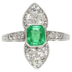 Edwardian Platinum Emerald & Diamond North/South Cluster Ring, Circa 1910