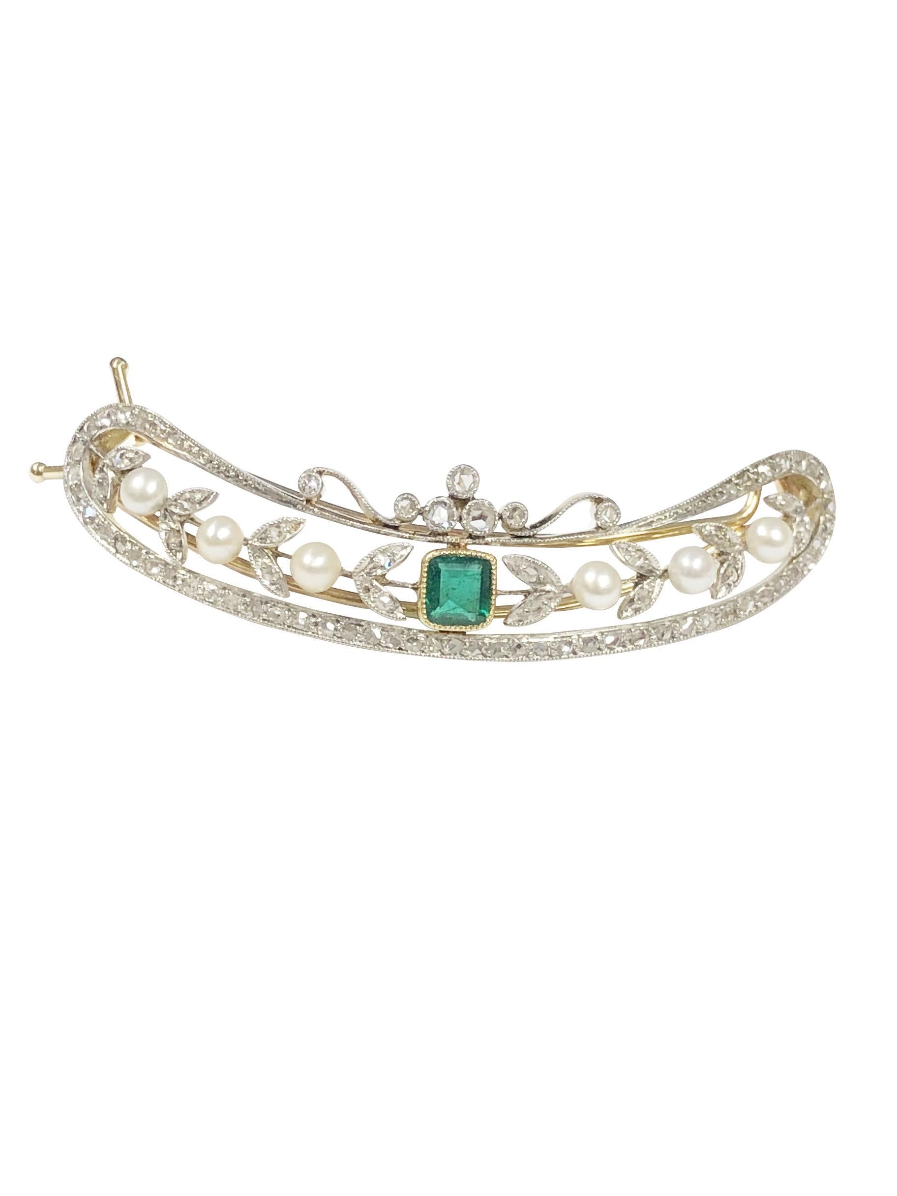 Circa 1915 Platinum top and Gold back Hair Barrett, measuring 2 1/4 inches in length and 1/2 inch wide. Centrally set with a Square step cut Emerald of very fine Color, Natural Pearls, and further surrounded by Rose cut Diamonds.  Absolute Excellent