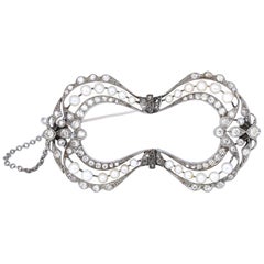 Edwardian Platinum Natural Pearls Diamonds Art Nouveau Bow Brooch