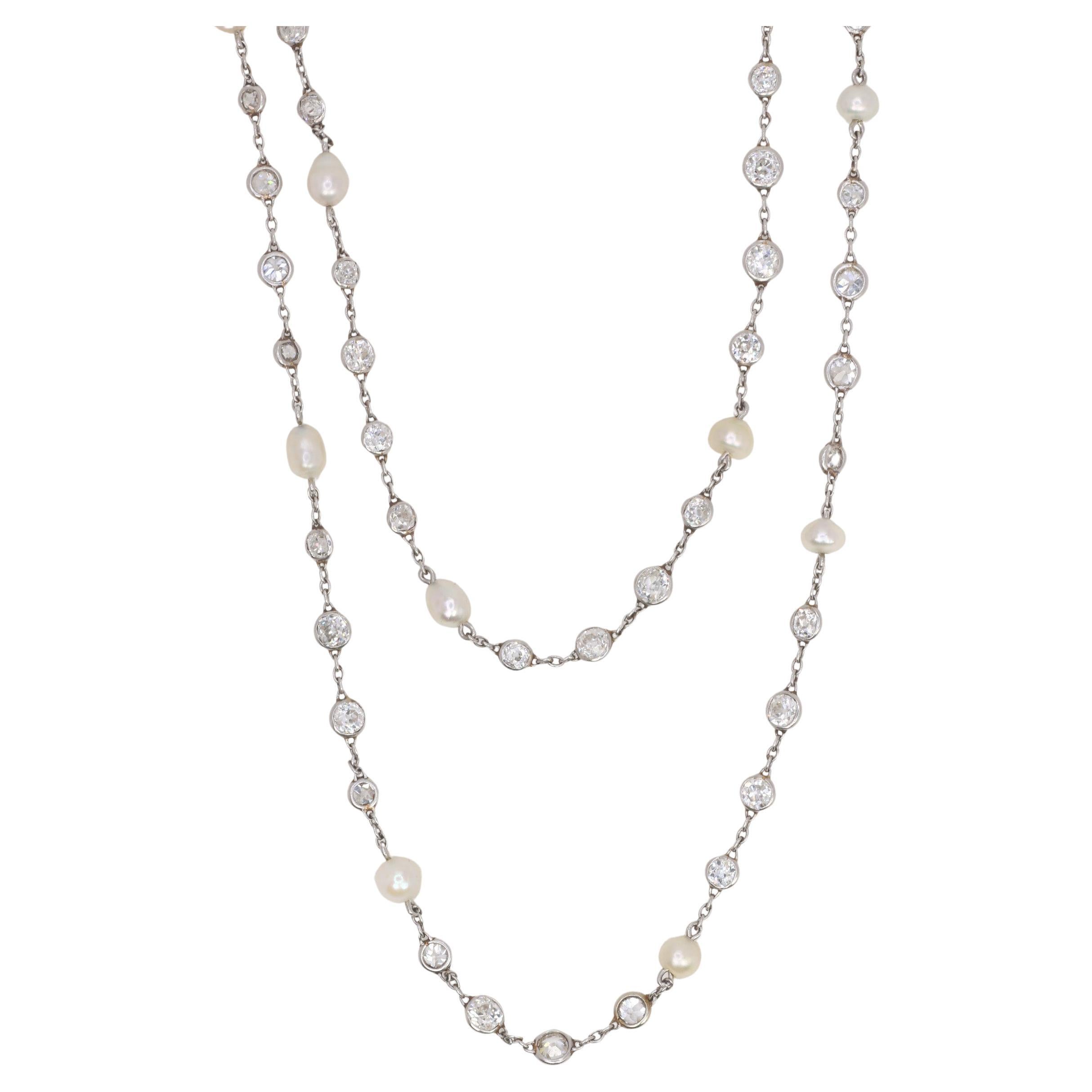 Edwardian platinum natural pearls diamonds long necklace