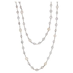 Edwardian platinum natural pearls diamonds long necklace