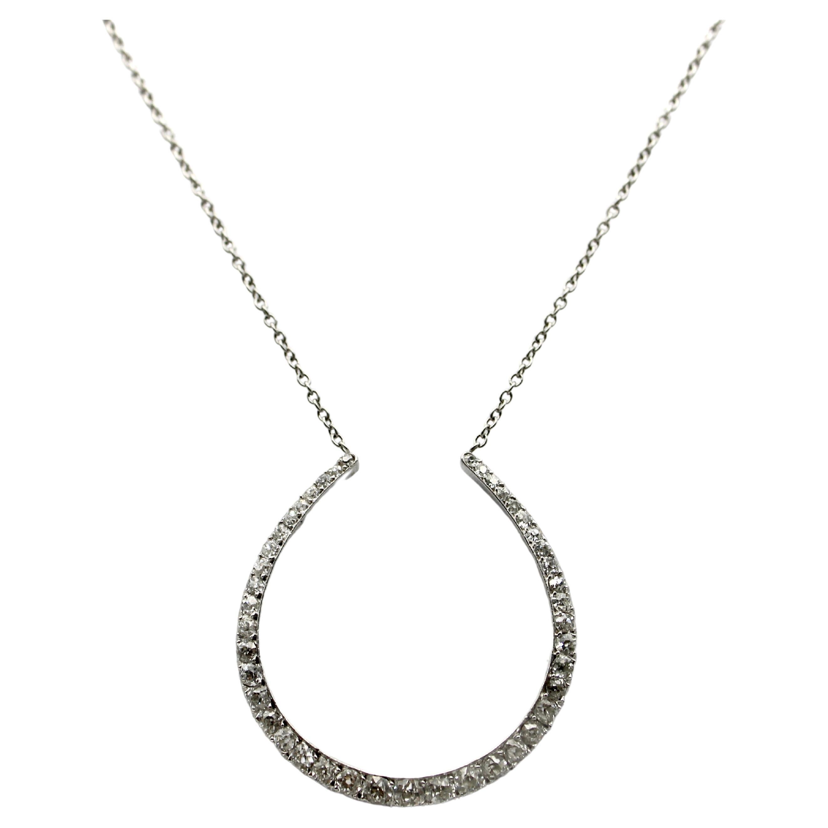 Edwardian Platinum Old Mine Cut Diamond Horse Shoe Necklace For Sale