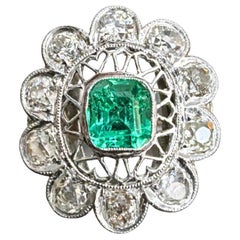 Edwardian Platinum Ring - 1.10ct Colombian Emerald 
Old Cut Diamonds