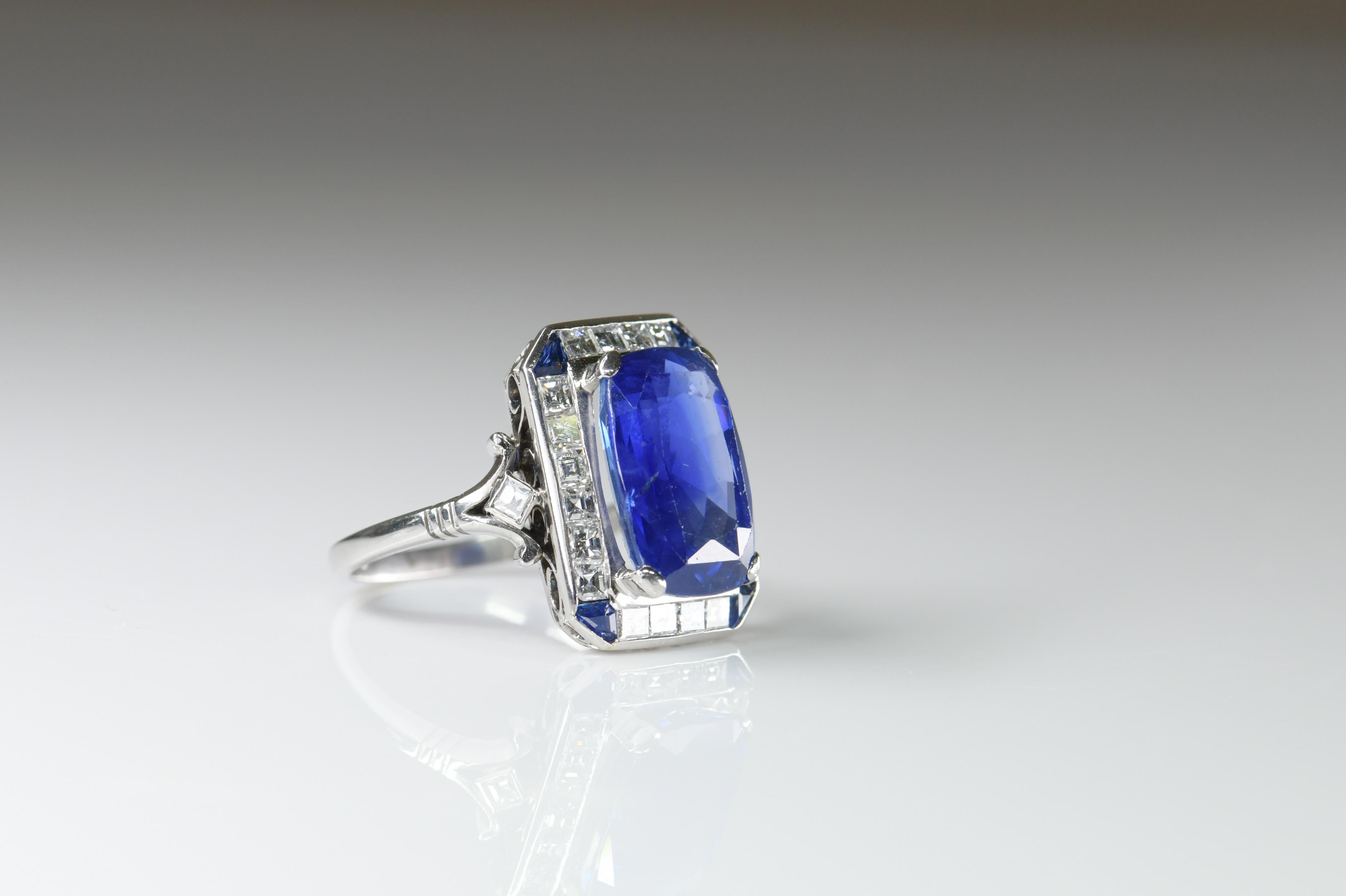 This is a stunning platinum ring that was made in the 1910s. It has been set with a beautiful 8.52arat no heat gem-quality Ceylon sapphire with Gem And Pearl Lab certification.

The elegant cushion-cut sapphire surround by 12 sparkling baguette-cut
