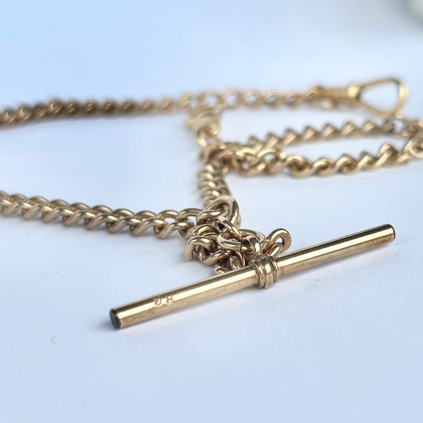 This simple yet beautiful rolled gold Albert is fastened using two dog clips and there is a t-bar on a loop. The chain is rolled gold which means it is coated in a fine layer of gold. 

Chain Length: 35cm

Weight: 17.7g