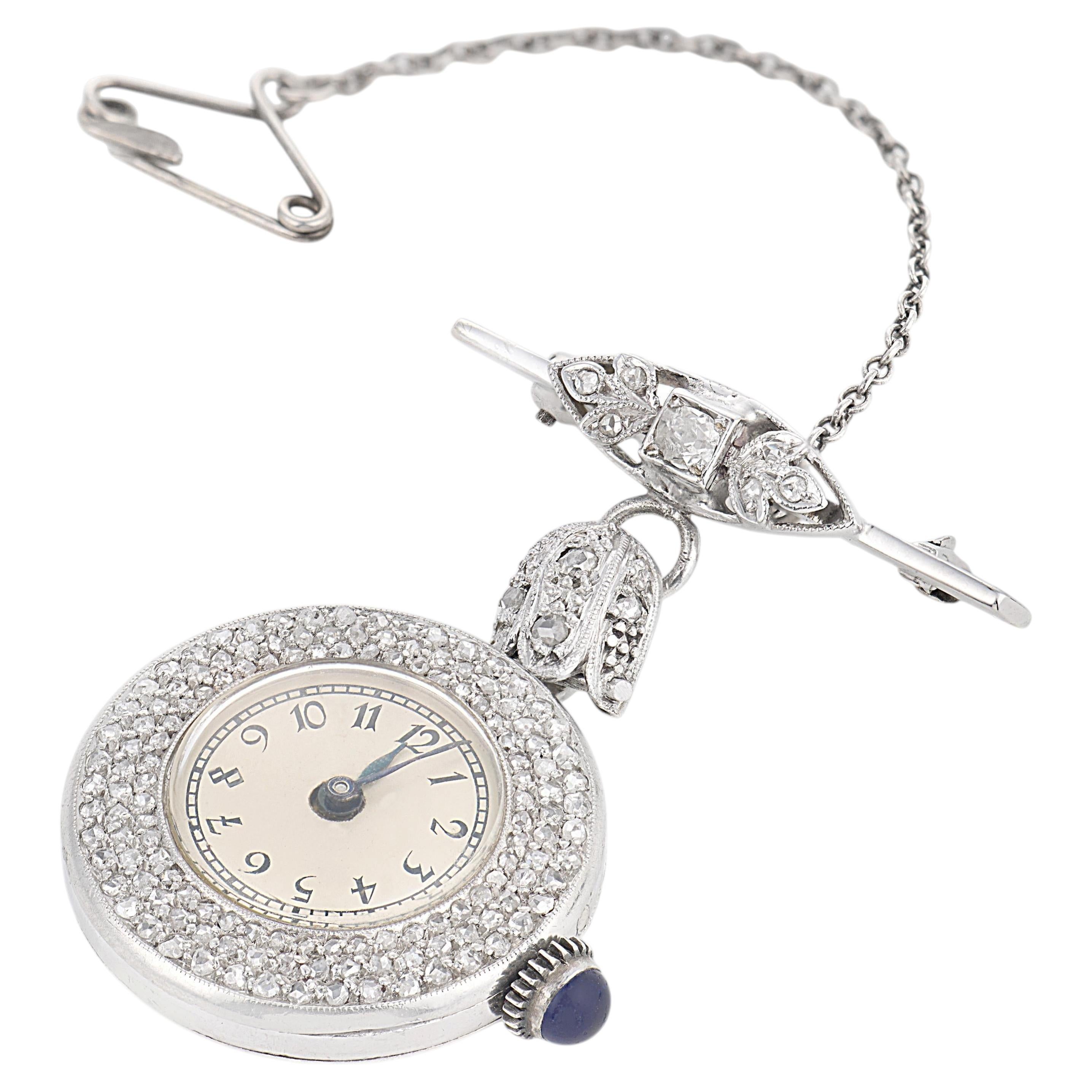 Broche-reloj eduardiano de platino con diamantes talla rosa