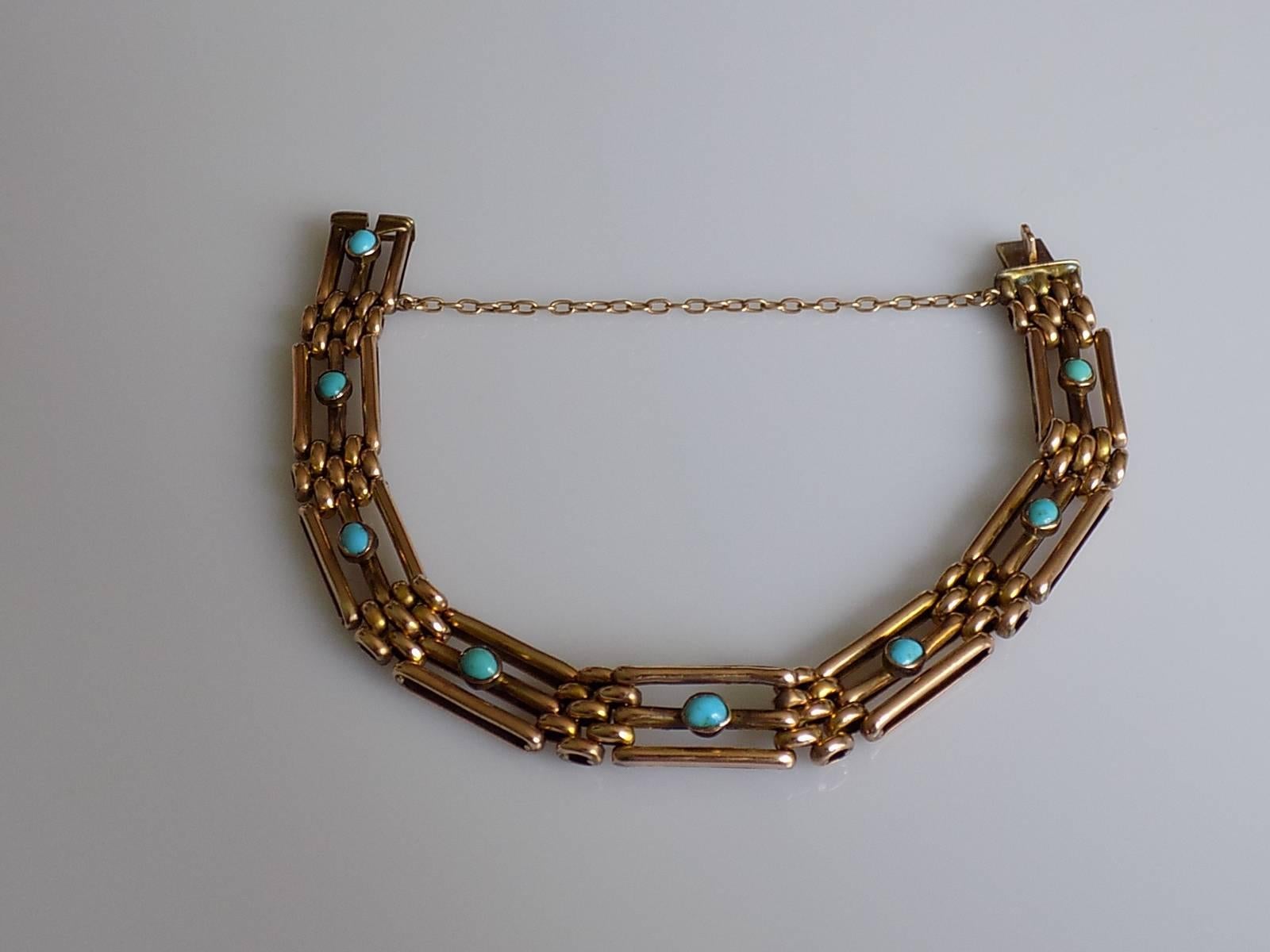 A Stunning Antique Edwardian c.1910 9 Carat Rose Gold and Turquoise Gate bracelet with a safety chain. English origin.
Length of the bracelet 7 1/4