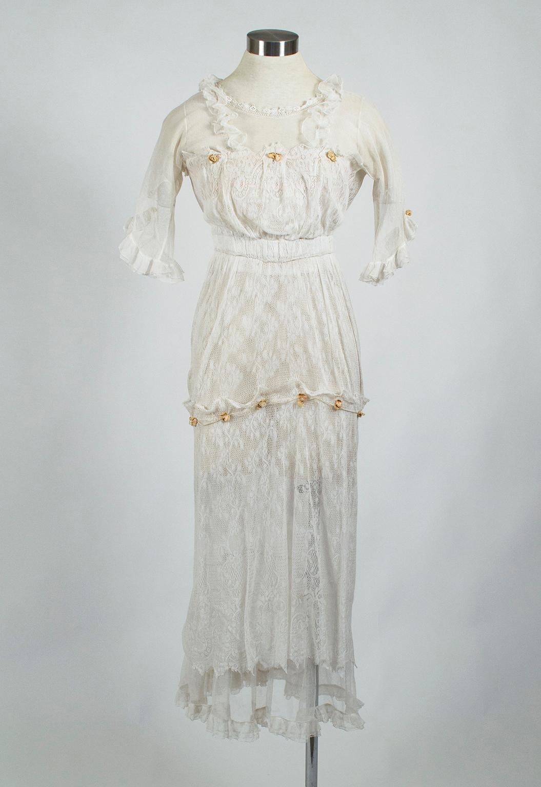 It’s easy to see why tea dresses such as this were sometimes called “pneumonia dresses”: their weightlessness provided little coverage and even less warmth (though the pounds of undergarments certainly compensated for both). Replete with the