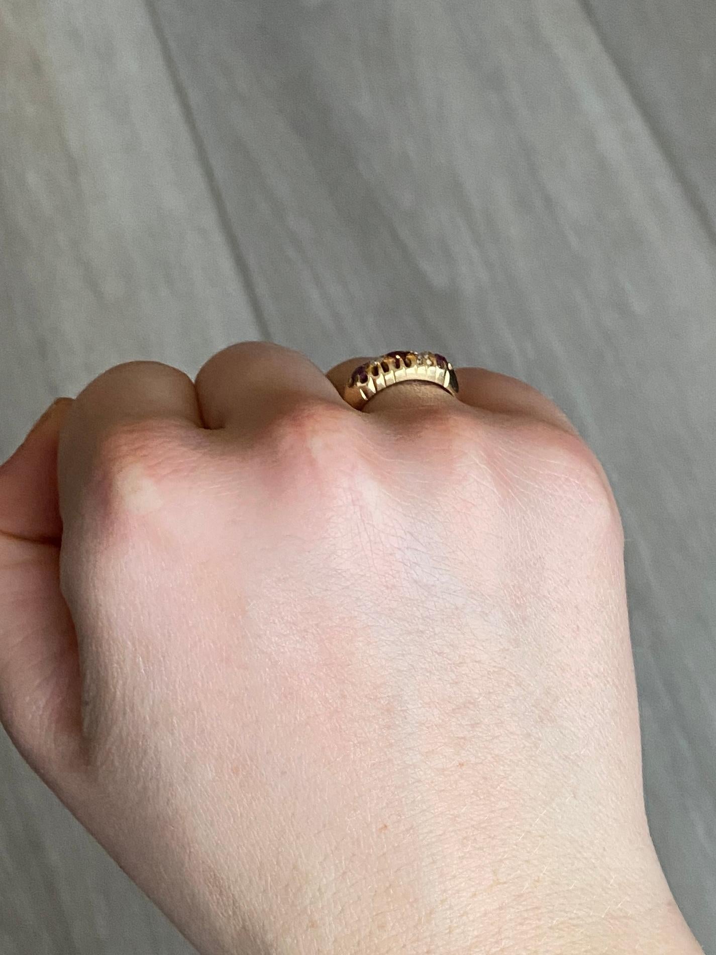 The three rubies in this five stone are a gorgeous red/pink and Toal 25pts. The diamonds total 15pts. Modelled in 18ct gold. 

Ring Size: J 1/2 or 5 
Band Width: 6mm 

Weight: 3.1g