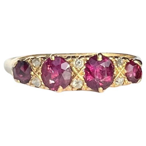 Edwardian Ruby and Diamond 18 Carat Gold Four-Stone Ring For Sale