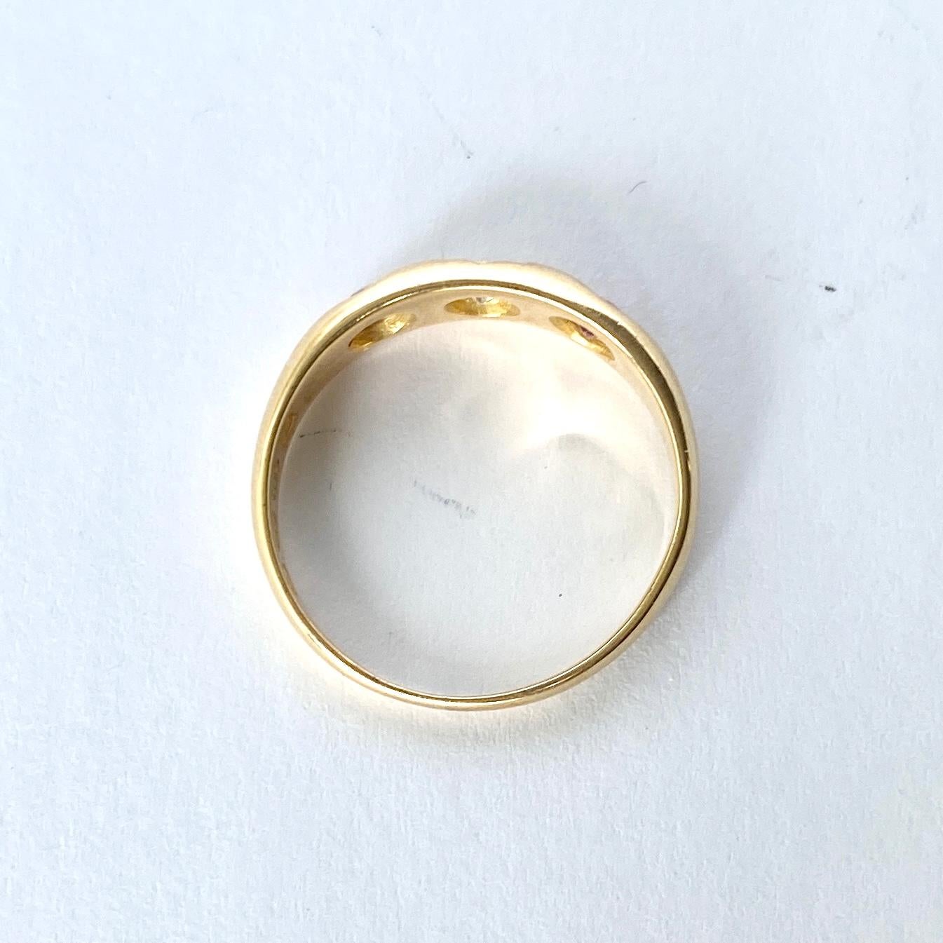 Round Cut Edwardian Ruby and Diamond 18 Carat Gold Three-Stone Gypsy Ring