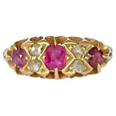 Edwardian Ruby and Diamond 18 Carat Gold Three-Stone Ring