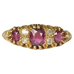 Edwardian Ruby and Diamond 18 Carat Gold Three-Stone Ring