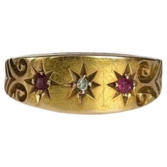 Antique Edwardian Ruby and Diamond 18 Carat Gold Three-Stone Star Setting Ring
