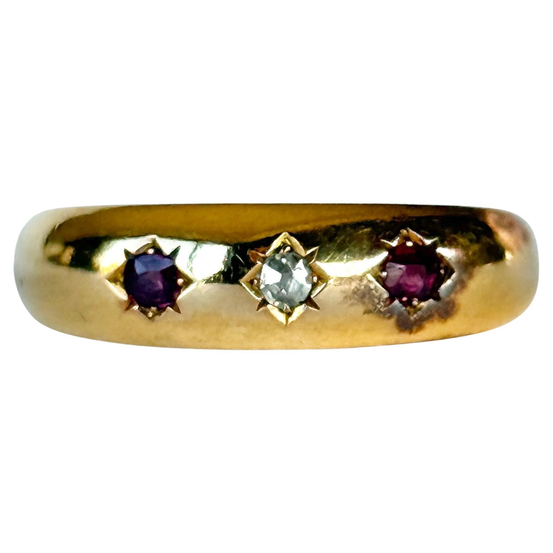 Edwardian Ruby and Diamond 18 Carat Gold Three-Stone Star Setting Ring For Sale