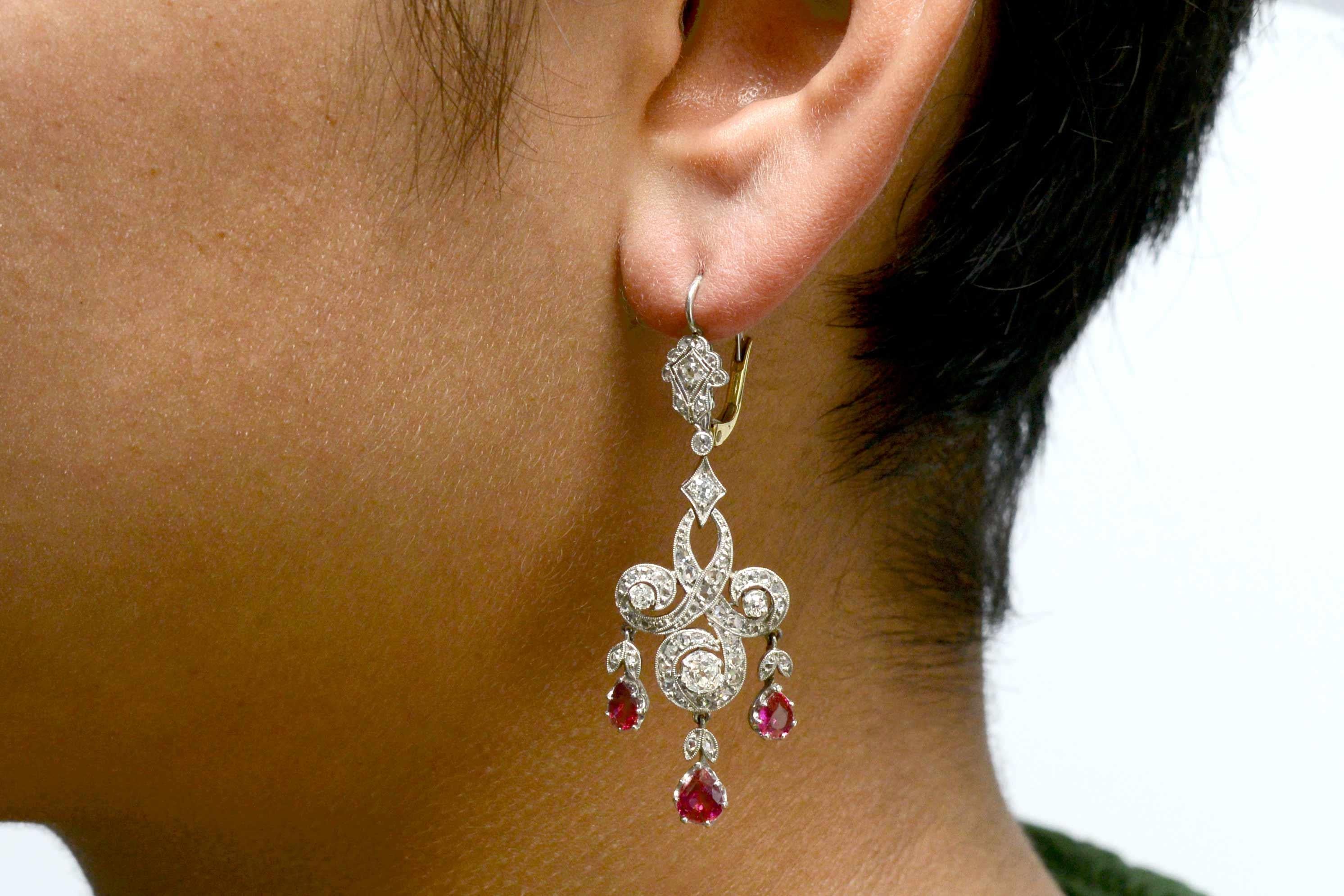 A pair of elegant revivalist Edwardian ruby and diamond chandelier earrings with an awesome 2