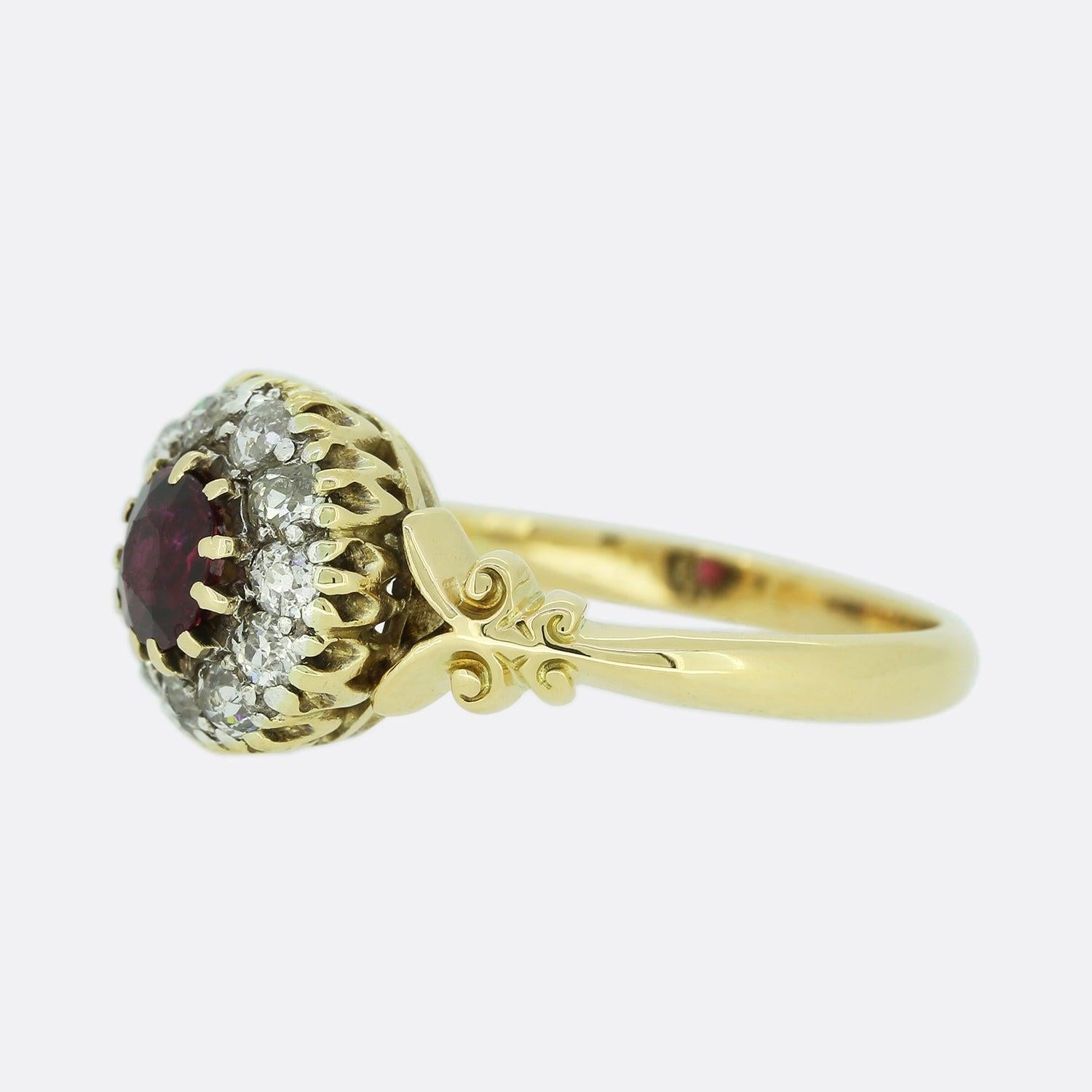 This is an 18ct yellow gold ruby and diamond cluster ring. The ring dates back to the Edwardian era and features a central dark red ruby which is highly complimented by the surrounding bright white old cut diamonds. 

Condition: Used (Very