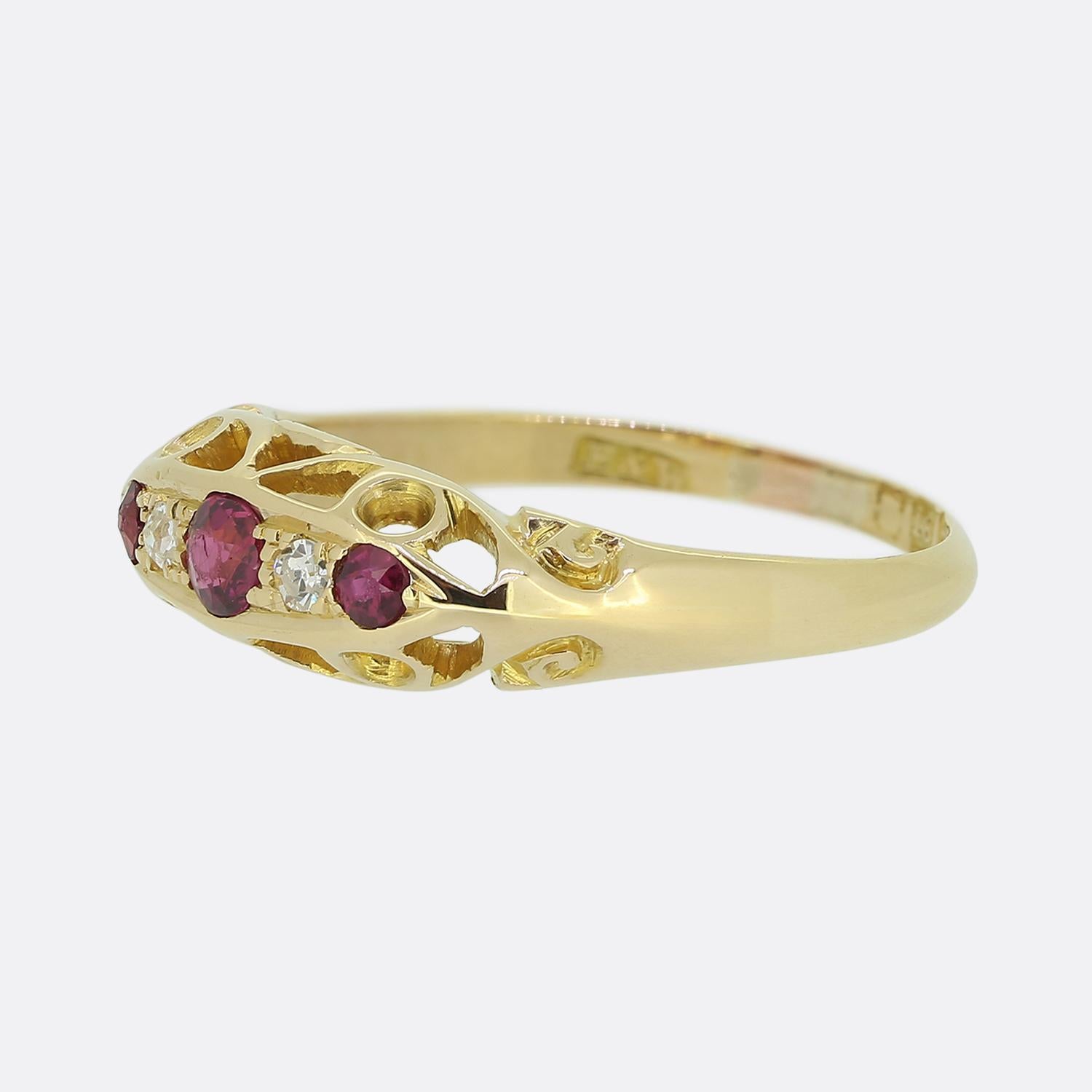 Here we have a delightful ruby and diamond ring dating back to the Edwardian period. This antique piece has been crafted from 18ct yellow gold and showcases a trio of perfectly matched red rubies. Each of these vivid stones has been individually