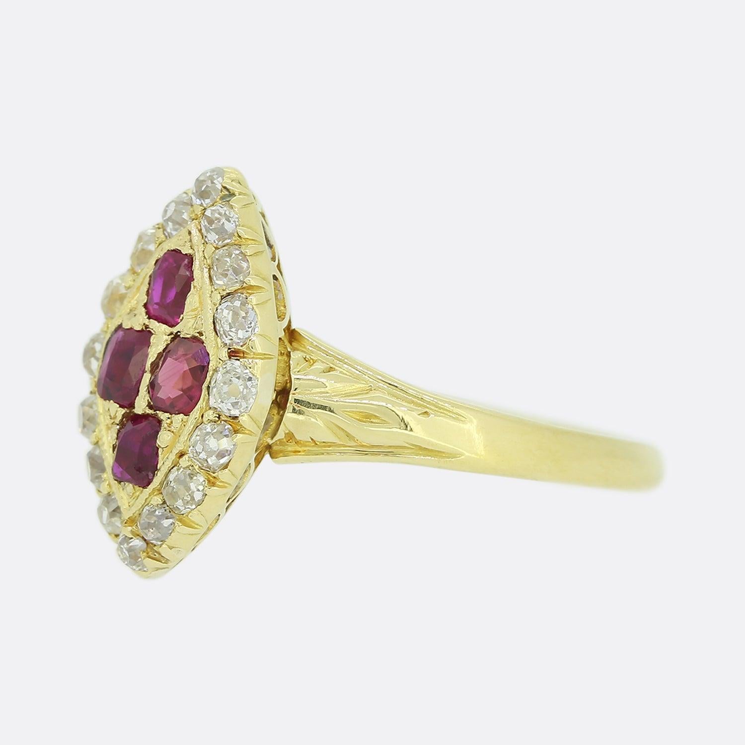 Here we have an excellently crafted ruby and diamond navette ring dating back to the Edwardian era. The ring's boat-shaped face showcases a quartet of cushion shaped rubies upon a mottled backdrop. These focal stones are accentuated by an array of