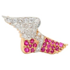 Broche antique Hermès en forme de pied ailé, en or 14 carats, platine et rubis, de style édouardien