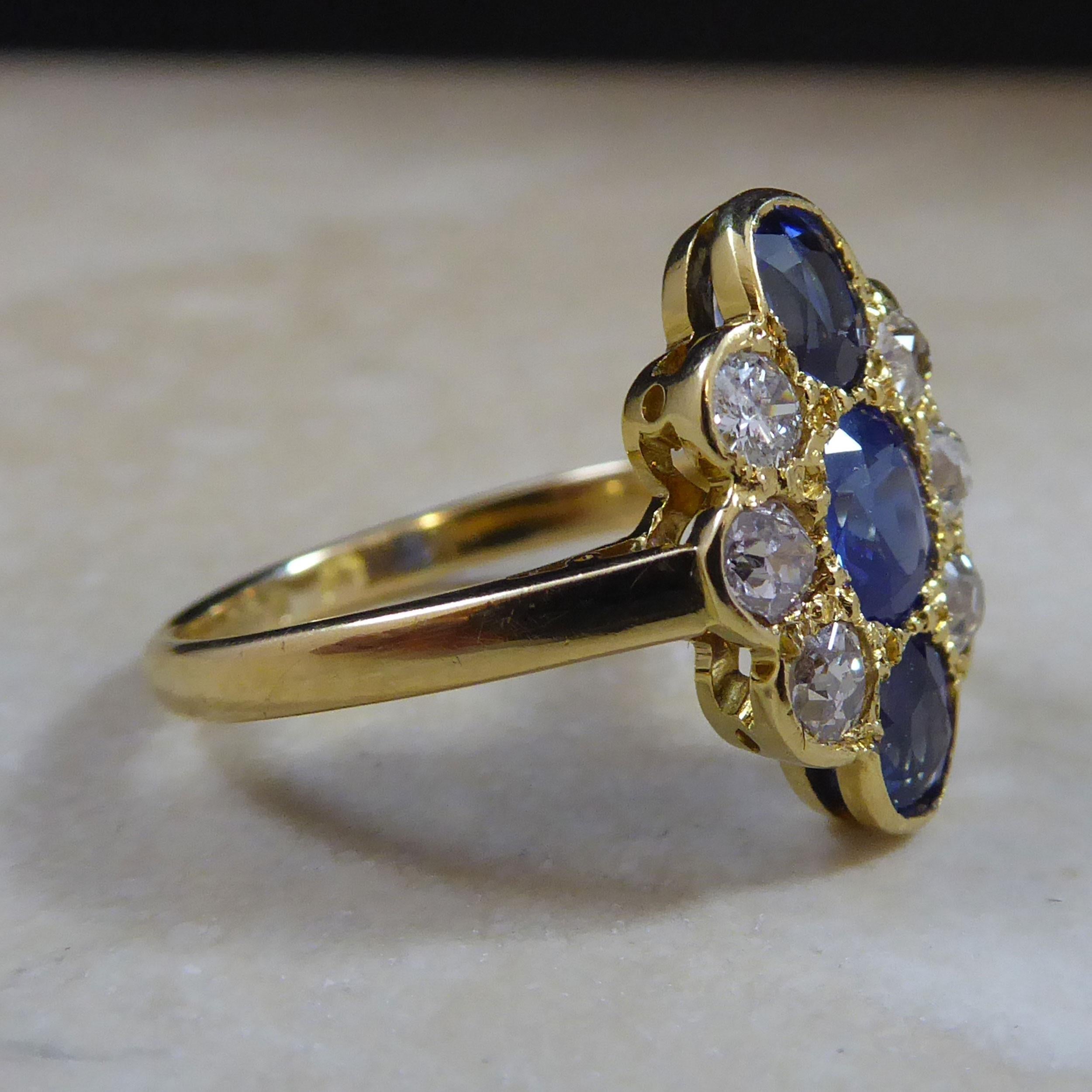 Oval Cut Edwardian Sapphire and Old European Cut Diamond Oval Cluster Ring, Circa 1900s