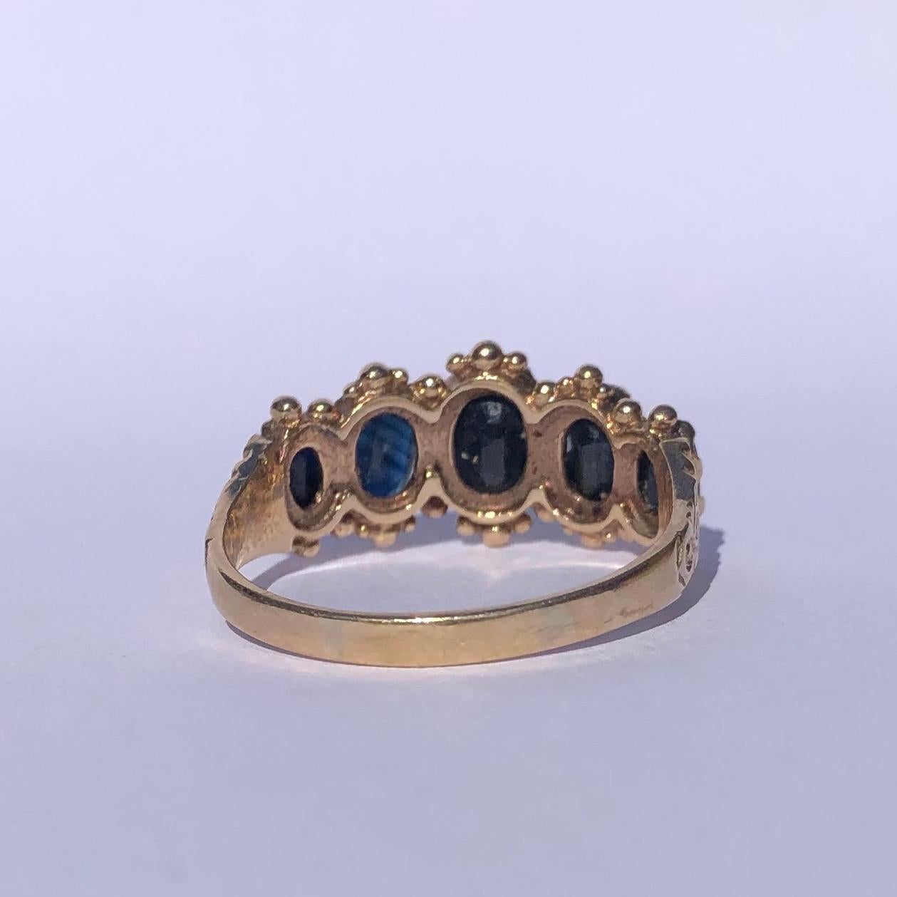 Oval Cut Edwardian Sapphire and 9 Carat Gold Five-Stone Ring