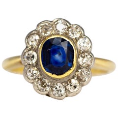 Edwardian Sapphire and Diamond 18 Carat and Platinum Cluster Ring