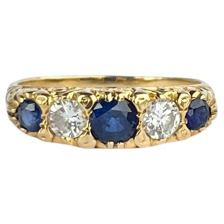 Edwardian Sapphire and Diamond 18 Carat Gold Five-Stone Ring For Sale