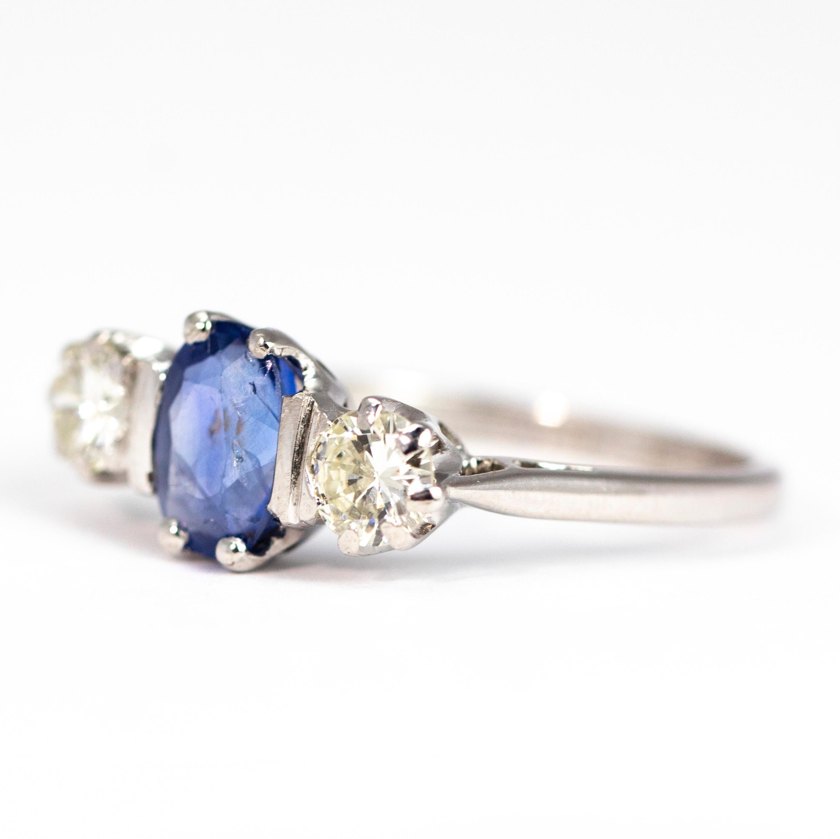 At the centre of this trio of beautiful stones is a bright blue sapphire measuring approximately 1.5carats. The diamonds either side measure 45pts each, are H colour VS2 and have a wonderful sparkle .

Ring Size: Q or 8

Weight: 4g