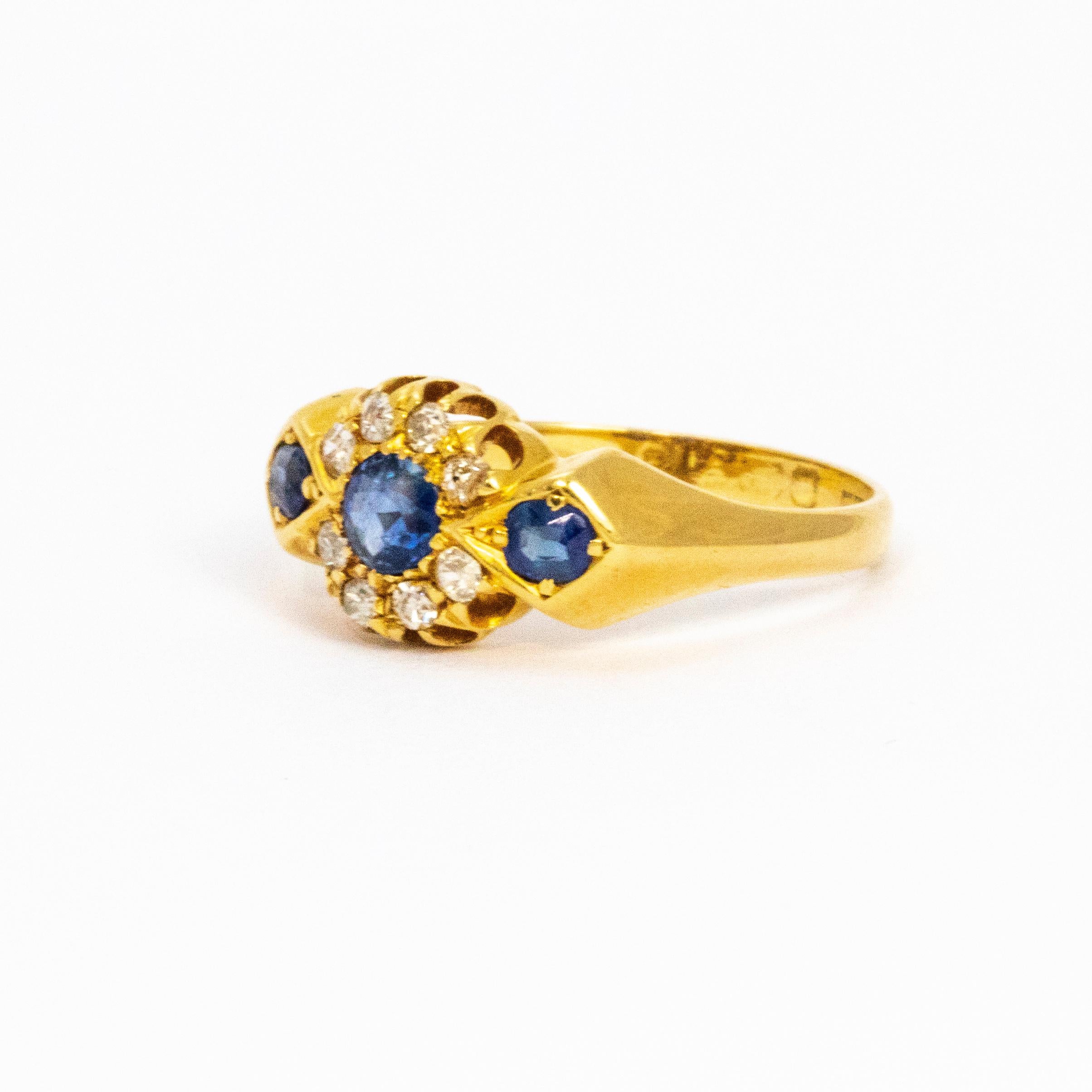 Shiny and sparkling Edwardian 18ct yellow gold ring set with soft cornflower blue Sapphires and diamonds.

Ring size: O or 7 1/4