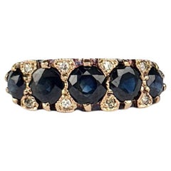 Edwardian Sapphire and Diamond 9 Carat Gold Five-Stone Ring Edwardian Sapphire and Diamond 9 Carat Gold Five-Stone Ring